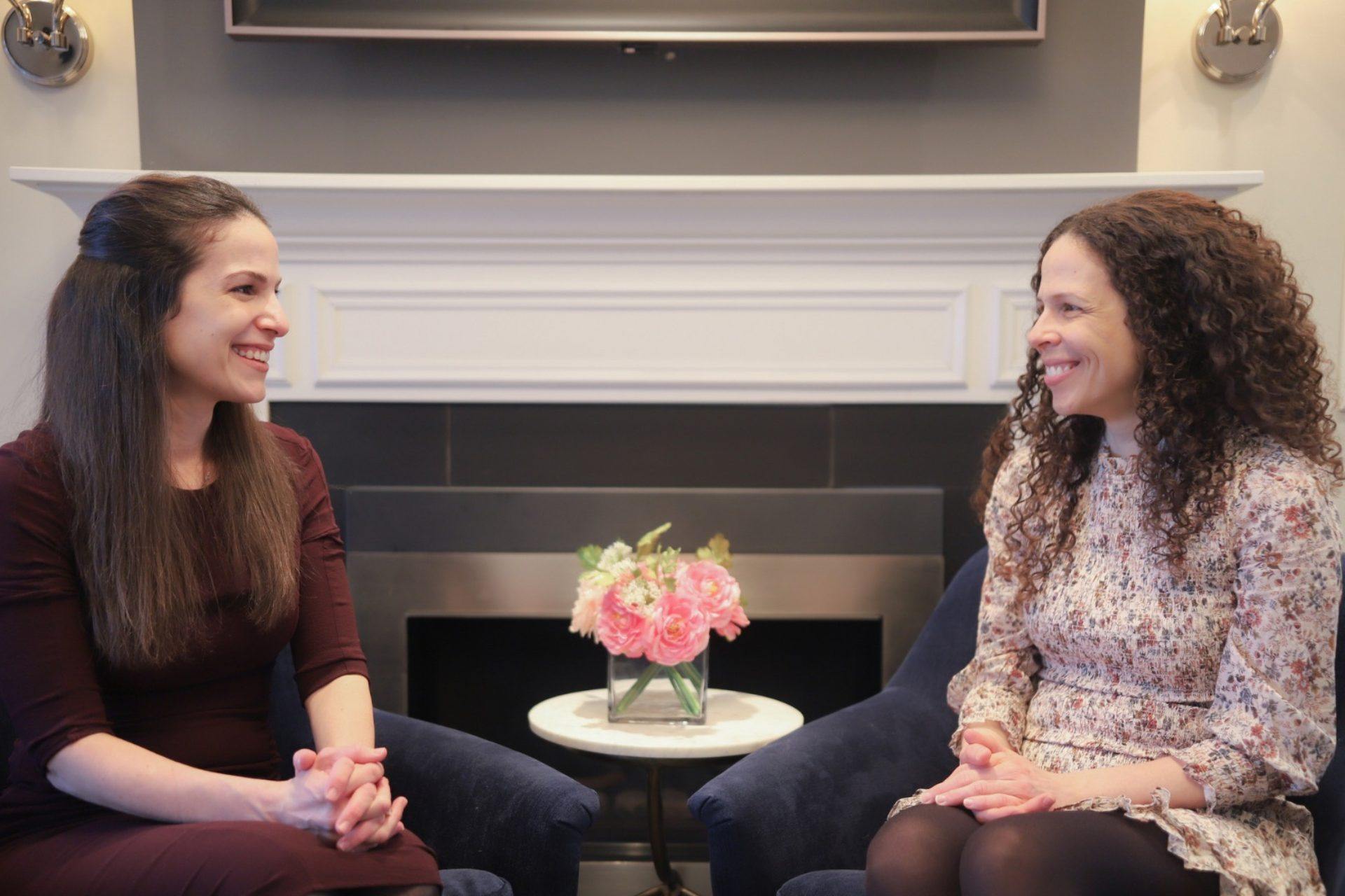 Nadia D'Iuso and Debora D'Iuso smiling next to each other